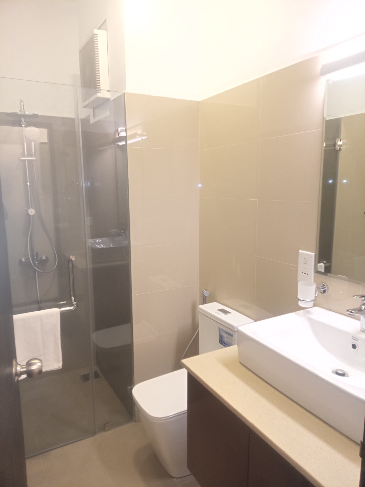 Modern private bathroom with glass shower