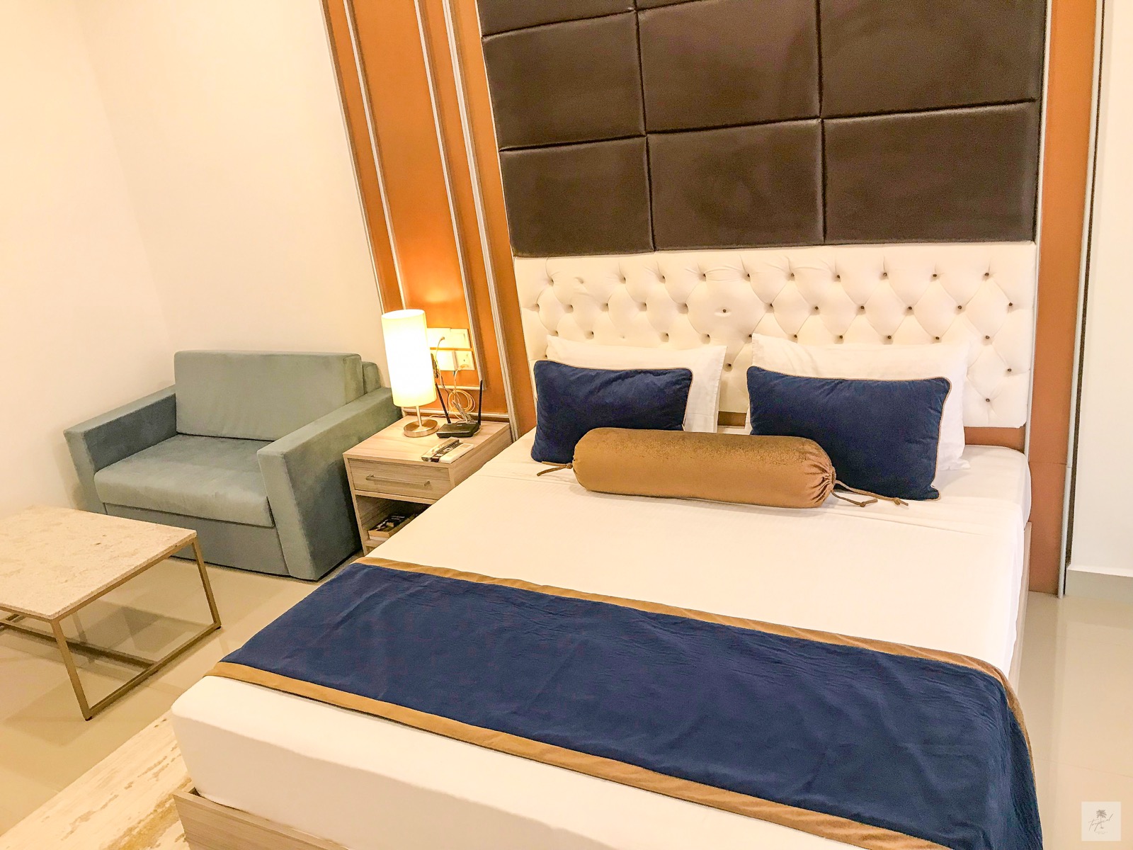 Bed and sofa area inside the apartment