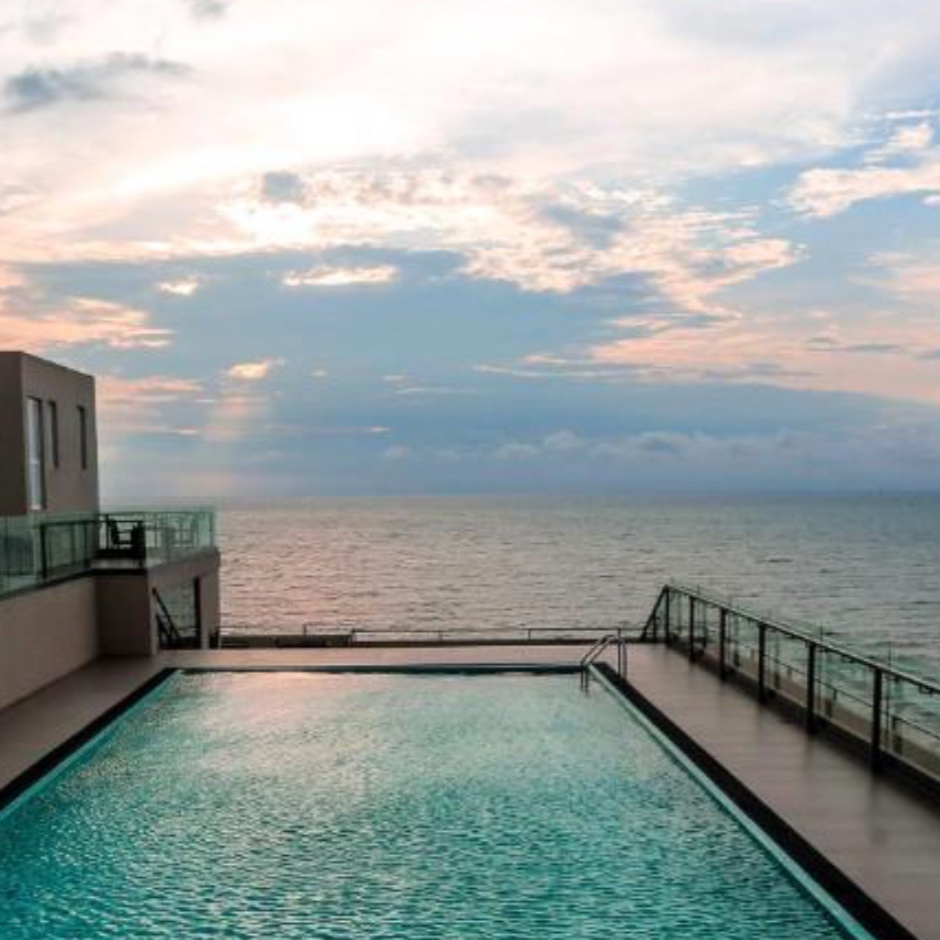 Rooftop pool area overlooking the ocean in Negombo